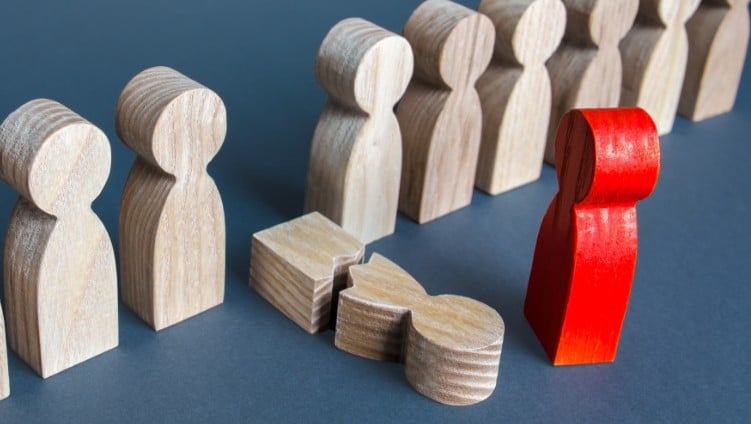 Wooden figures illustrating bullying prevention and legal protections for children.